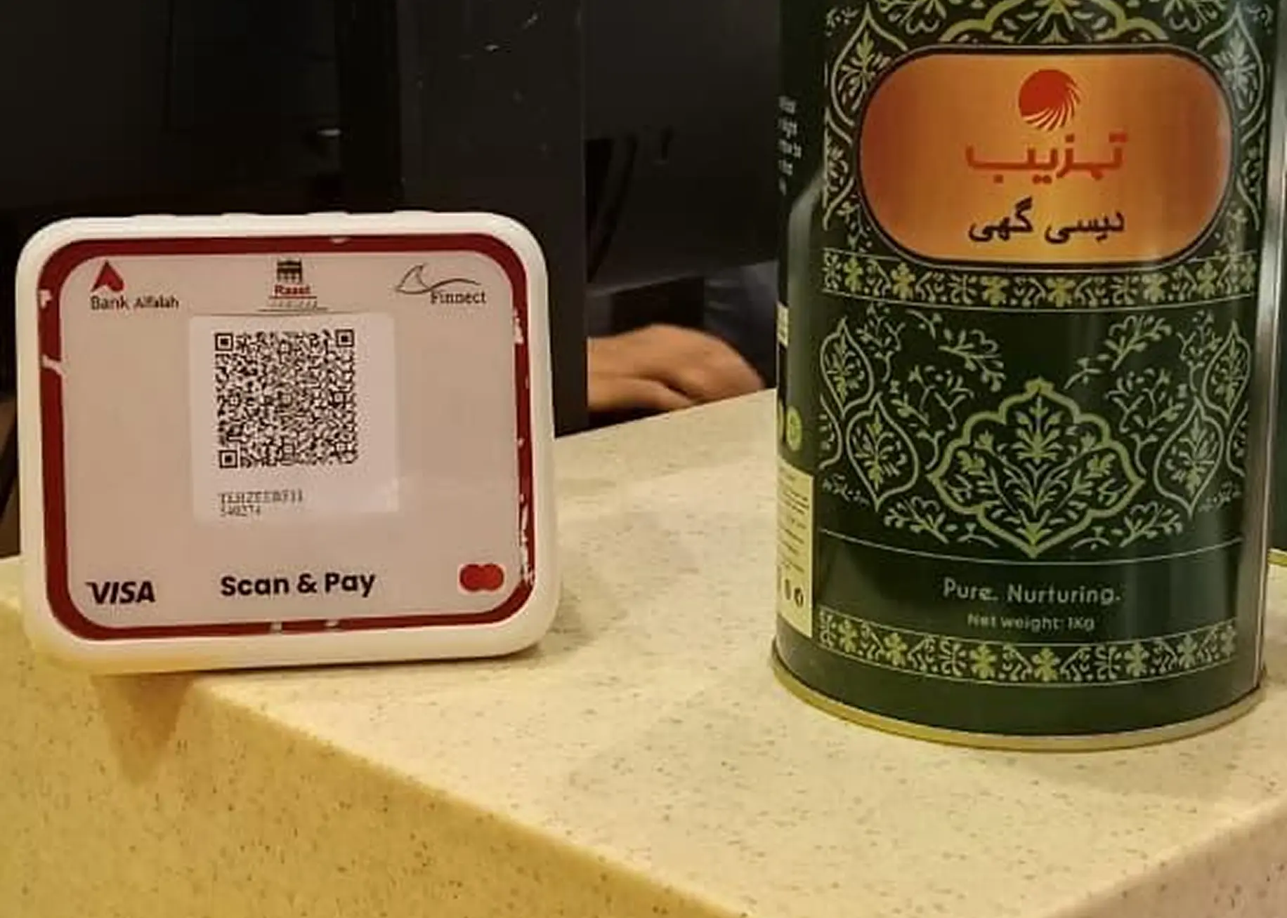 Finnect Scan & Pay QR device on the cash counter at an Tehzeeb